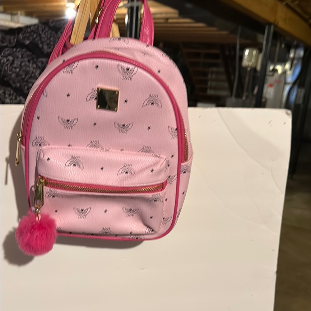 Claire's Pink Mini Backpack with Pom Pom Charm